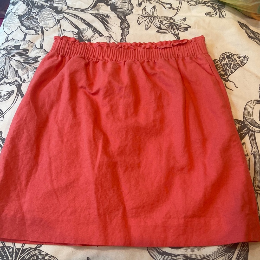 Coral mini skirt with elastic waistband. Size small. J. Crew.